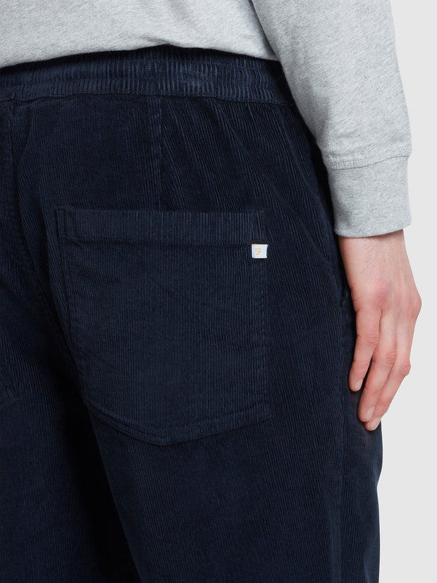 Hawtin Tapered Fit Drawstring Cord Trousers In True Navy
