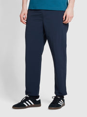 Hawtin Tapered Fit Drawstring Trousers In True Navy