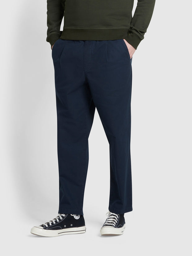Hawtin Tapered Fit Canvas Drawstring Trousers In True Navy